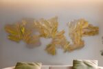 DRAKO-ESCULTURA PARED-ACERO DORADO. SCHULLER